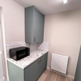 Mrs Jordan - Fjord Green Slab Kitchen