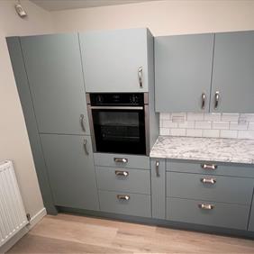 Mrs Jordan - Fjord Green Slab Kitchen